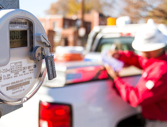 Dominion Energy Employee Installing Smart Meter