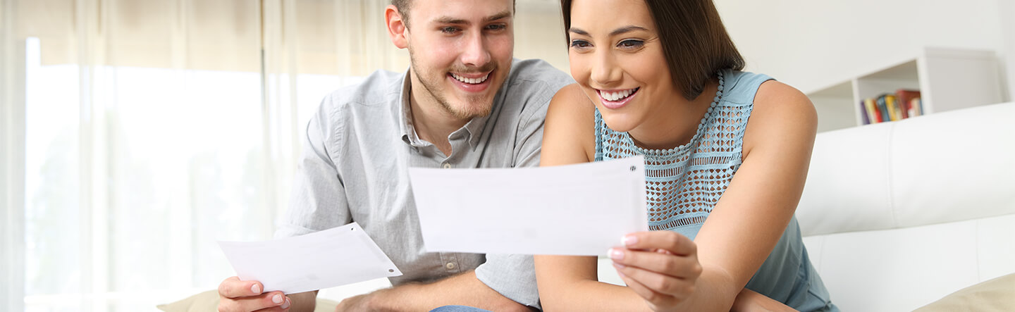Couple Looking at Bill
