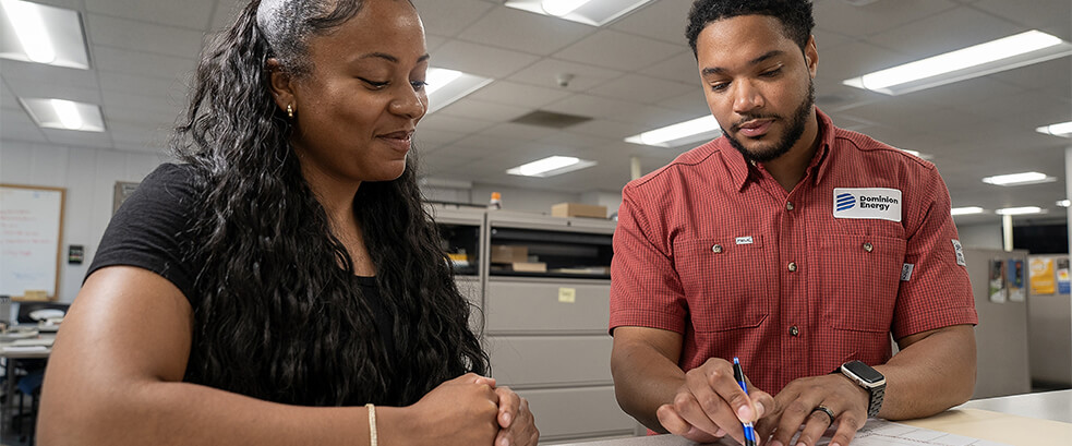 Dominion Energy Employee Meeting With Customer